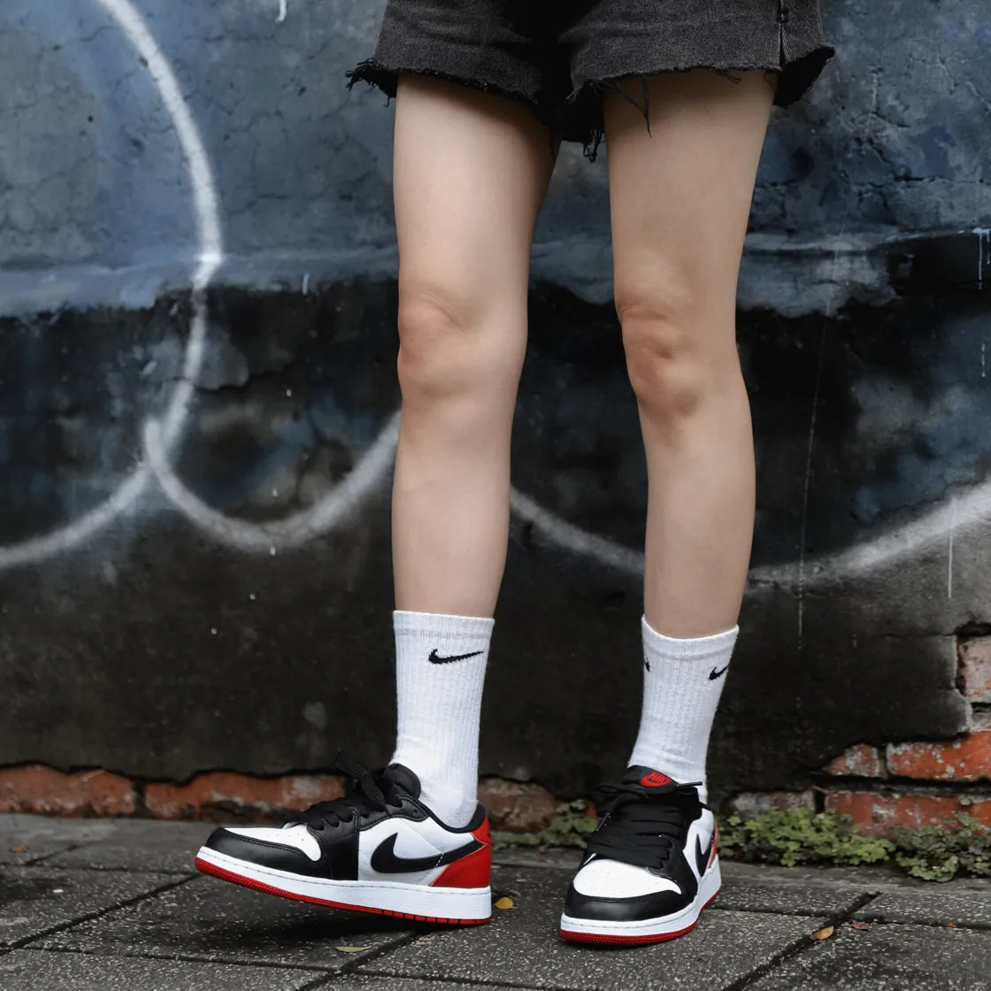 Aj1 low black toe sales on feet